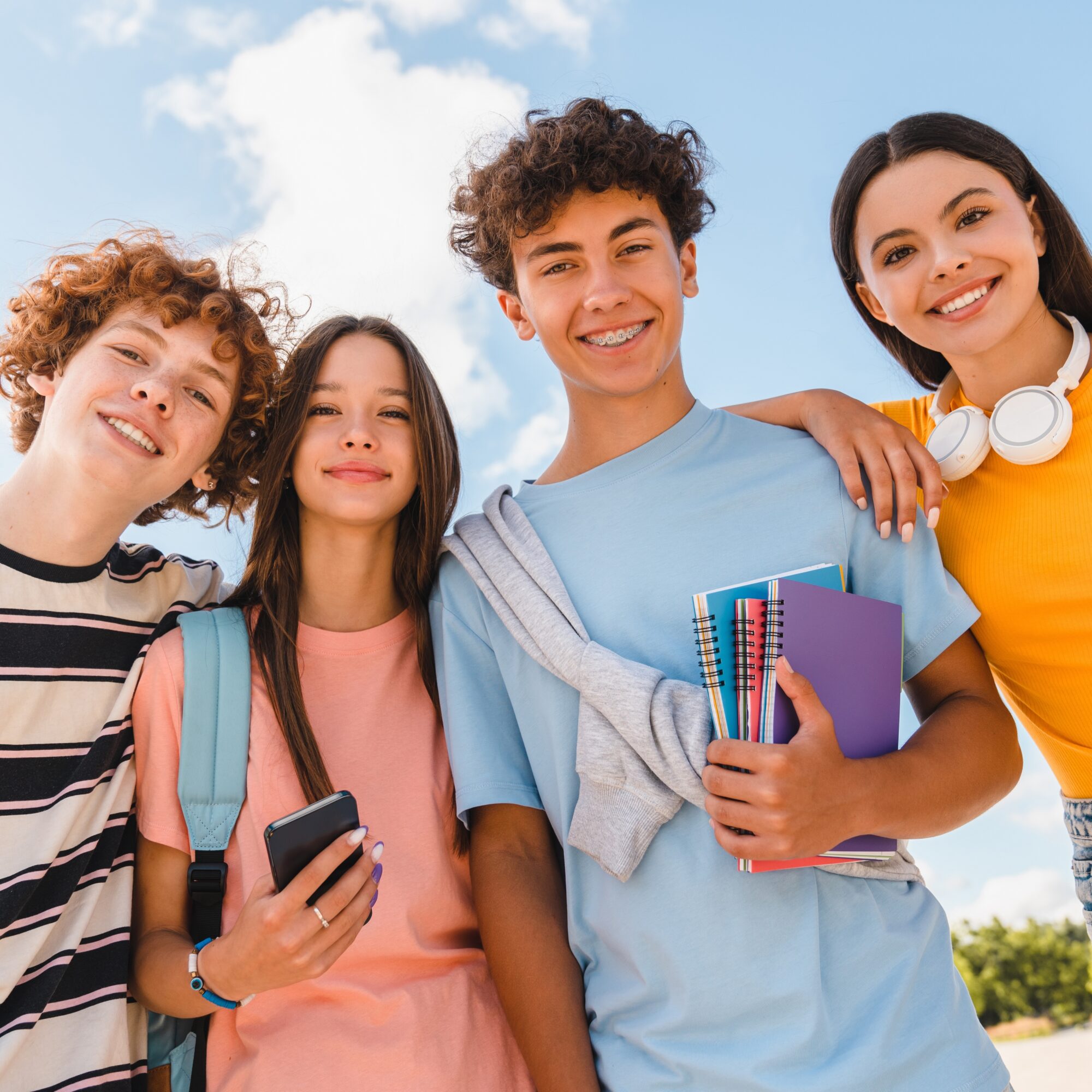 children smiling with braces